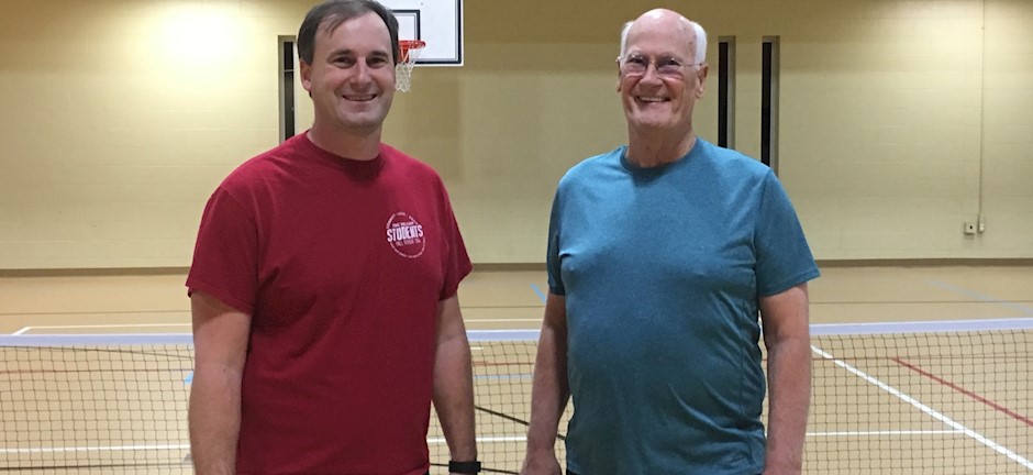 father and son playing pickleball in trussville, birmingham pickleball, pickleball, family pickleball, southside baptist church, southside, alabama