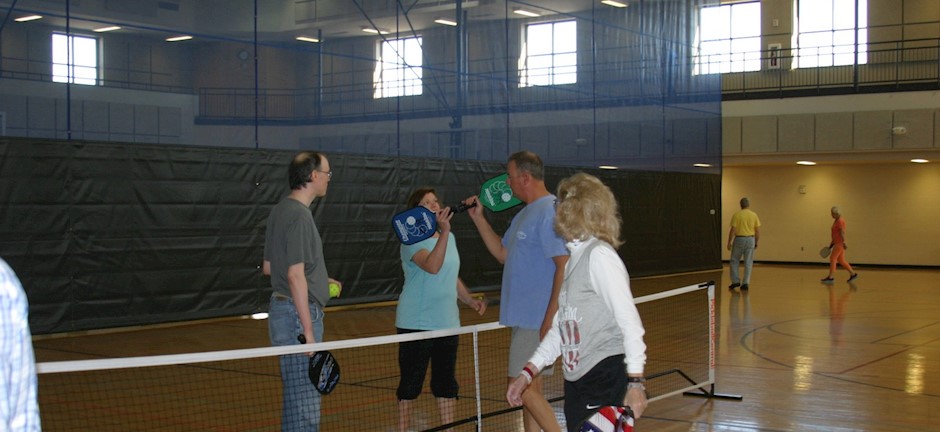 husband and wife, mother and son playing pickleball in trussville alabama, alabama pickleball, trussville pickleball, birmingham pickleball