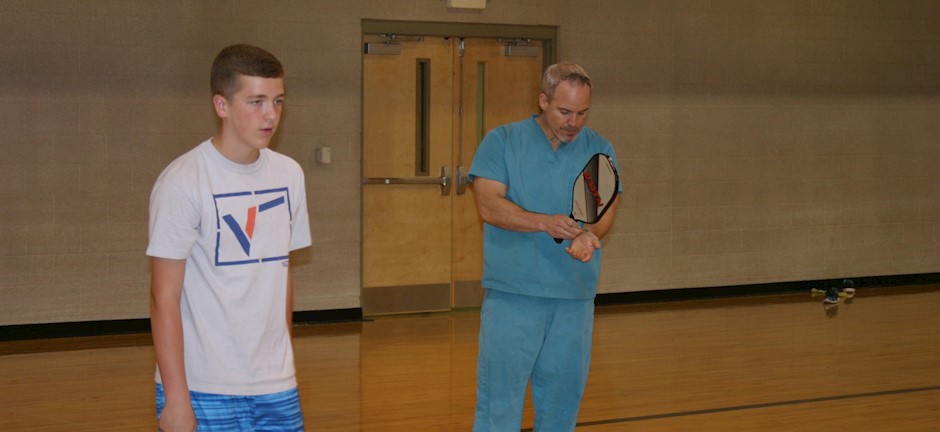 father and son playing pickleball in trussville alabama, alabama pickleball, trussville pickleball, birmingham pickleball